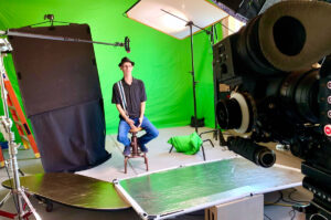 Summitstar Studios soundstage with lighting grid and green screen